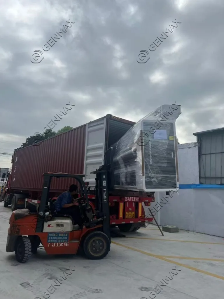 Commercial ultrasonic quilting machinery wrapped in protective material awaiting shipment