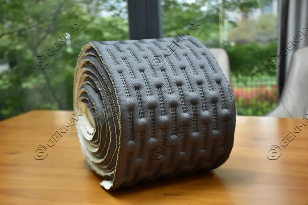 Dark charcoal mattress border fabric with raised brick offset rectangle pattern produced by ultrasonic quilting machine